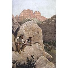 Apaches vigilando desde las rocas